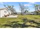 A well-maintained backyard with a concrete patio and outdoor seating provides ample space for outdoor activities and relaxation at 7150 Richardson Rd, Sarasota, FL 34240