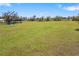 Expansive green lot offering ample space and serene country living in a charming residential setting at 7150 Richardson Rd, Sarasota, FL 34240