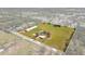 Aerial view of the property highlighting the property lines, spacious land, and surrounding landscape at 7150 Richardson Rd, Sarasota, FL 34240