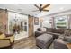 View of a living room featuring an access to a dining room separated by a sliding barn door at 7150 Richardson Rd, Sarasota, FL 34240