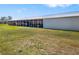 Large metal building offering versatile space for storage, workshop, or other potential uses at 7150 Richardson Rd, Sarasota, FL 34240