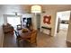 Open floor plan of living, dining and kitchen area with natural lighting at 3900 Roxane Blvd # 10A, Sarasota, FL 34235