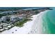 Aerial view of the beach, ocean, and city at 1080 Peppertree W Ln # 602, Sarasota, FL 34242