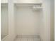 Walk-in closet with built-in shelf and clothes rack at 1080 Peppertree W Ln # 602, Sarasota, FL 34242
