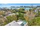Stunning aerial view from a balcony overlooking the neighborhood, canal, and the ocean at 111 Faubel St, Sarasota, FL 34242