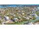 Picturesque tropical neighborhoods with waterfront homes, lush vegetation, and canal access to the open ocean at 111 Faubel St, Sarasota, FL 34242