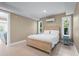 Bedroom with a bed, two side tables and natural light at 111 Faubel St, Sarasota, FL 34242