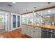 Bright kitchen featuring wooden countertops, an island, recessed lighting, and appliances at 111 Faubel St, Sarasota, FL 34242