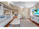 Inviting living room with hardwood floors, comfortable seating, and a kitchen view at 111 Faubel St, Sarasota, FL 34242
