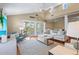 Living room with balcony access, wood floors, and comfortable seating at 111 Faubel St, Sarasota, FL 34242