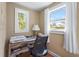 Small home office space with natural light and wooden desk at 111 Faubel St, Sarasota, FL 34242