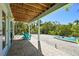 Cozy covered patio with outdoor seating and easy access to nature and kayaking at 111 Faubel St, Sarasota, FL 34242