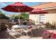 Outdoor barbecue and picnic area with multiple grills and tables for community gatherings at 1250 N Portofino Dr # 203, Sarasota, FL 34242