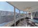 Water view from a lovely screened lanai, perfect for relaxing and enjoying the Florida sunshine at 1250 N Portofino Dr # 203, Sarasota, FL 34242