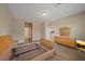 Spacious bedroom with platform bed frame and access to the ensuite at 13804 Camden Crest Ter, Lakewood Ranch, FL 34211