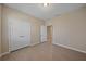 Bedroom with tile flooring and a closet with double doors at 13804 Camden Crest Ter, Lakewood Ranch, FL 34211