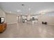 Expansive living room and kitchen with tile flooring and lots of natural light at 13804 Camden Crest Ter, Lakewood Ranch, FL 34211