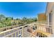 Balcony overlooking parking and beautiful, mature landscaping and trees at 14021 Bellagio Way # 410, Osprey, FL 34229