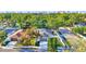 Aerial view of the house, showing the neighborhood and landscaped front yard at 1422 19Th St, Sarasota, FL 34234