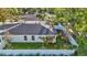 Aerial view of the property showcasing the backyard, patio, and well-manicured landscaping at 1422 19Th St, Sarasota, FL 34234