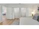 Spacious bedroom featuring walk-in closets and a view into the living area at 1422 19Th St, Sarasota, FL 34234