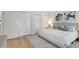 Serene bedroom with modern decor, neutral colors, and ample closet space for storage at 1422 19Th St, Sarasota, FL 34234
