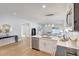 Modern kitchen with stainless steel appliances, island seating, and lots of natural light at 1422 19Th St, Sarasota, FL 34234