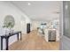 Bright, open-concept living space with wood floors and lots of natural light at 1422 19Th St, Sarasota, FL 34234