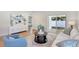 Inviting living room featuring modern furnishings, sleek floors, and access to the outdoors at 1422 19Th St, Sarasota, FL 34234