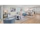 Open floor plan with a comfortable living area that flows seamlessly into the dining area at 1422 19Th St, Sarasota, FL 34234