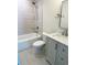 Updated bathroom features a shower-tub combo, marbled vanity top, and modern fixtures at 1426 19Th St, Sarasota, FL 34234