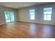Spacious living room with sliding glass doors leading to the backyard, offering great natural light at 1426 19Th St, Sarasota, FL 34234