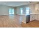 Open-concept living space featuring lots of light and an eat-in kitchen at 1426 19Th St, Sarasota, FL 34234
