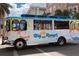 Exterior of Bay Runner shuttle bus with bright colors and clear windows for comfortable transportation at 1426 19Th St, Sarasota, FL 34234