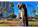 A lively street view with a statue of a sailor kissing a nurse and modern buildings at 1426 19Th St, Sarasota, FL 34234