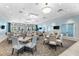 Clubhouse dining area with neutral tones, modern lighting, and large windows with resort views at 15225 Lyla Ter, Bradenton, FL 34211