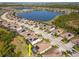 Beautiful home with screened lanai and solar panels in a lakeside community with mature landscaping at 18013 Polo Trl, Bradenton, FL 34211