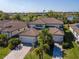 Beautiful two-story home boasting a tile roof, two-car garage, and lush landscaping in a desirable neighborhood at 18013 Polo Trl, Bradenton, FL 34211