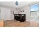 Bedroom features wood floors, bunk bed, closet and modern lighting, offering a functional living space at 18013 Polo Trl, Bradenton, FL 34211