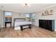 Spacious bedroom featuring wood floors, crown molding, and light fixtures, offering a relaxing retreat at 18013 Polo Trl, Bradenton, FL 34211