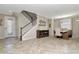 Inviting foyer with tile flooring, staircase, and dining area providing an open and airy feel at 18013 Polo Trl, Bradenton, FL 34211