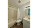Cozy bathroom with shower-tub combination, white toilet, and vanity offering a functional space at 2632 Hidden Lake N Dr # E, Sarasota, FL 34237