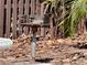 Community charcoal grill in the outdoor picnic area at 2632 Hidden Lake N Dr # E, Sarasota, FL 34237