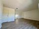 Bright and airy living room with modern flooring and neutral paint at 2632 Hidden Lake N Dr # E, Sarasota, FL 34237