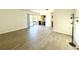 Living room with modern flooring and sliding glass doors to a balcony at 2632 Hidden Lake N Dr # E, Sarasota, FL 34237