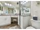 Bathroom featuring a double sink vanity with white cabinets and a glass-enclosed shower at 2908 Fiddlers Bnd, Palmetto, FL 34221