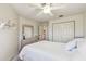 Bedroom with a comfortable bed, neutral decor, and a view of the closet at 2908 Fiddlers Bnd, Palmetto, FL 34221