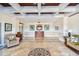 Inviting lobby featuring tiled floors, elegant furnishings, and tasteful artwork for a sophisticated ambiance at 2908 Fiddlers Bnd, Palmetto, FL 34221