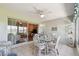 Bright and airy patio with a glass-topped table and comfortable seating, perfect for outdoor enjoyment at 2908 Fiddlers Bnd, Palmetto, FL 34221