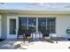 Outdoor patio area with furniture is perfect for enjoying outdoor relaxation and backyard views at 2908 Fiddlers Bnd, Palmetto, FL 34221